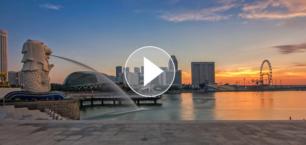Vue emblématique de Singapour au coucher du soleil, offrant des expériences authentiques et des escapades exclusives.