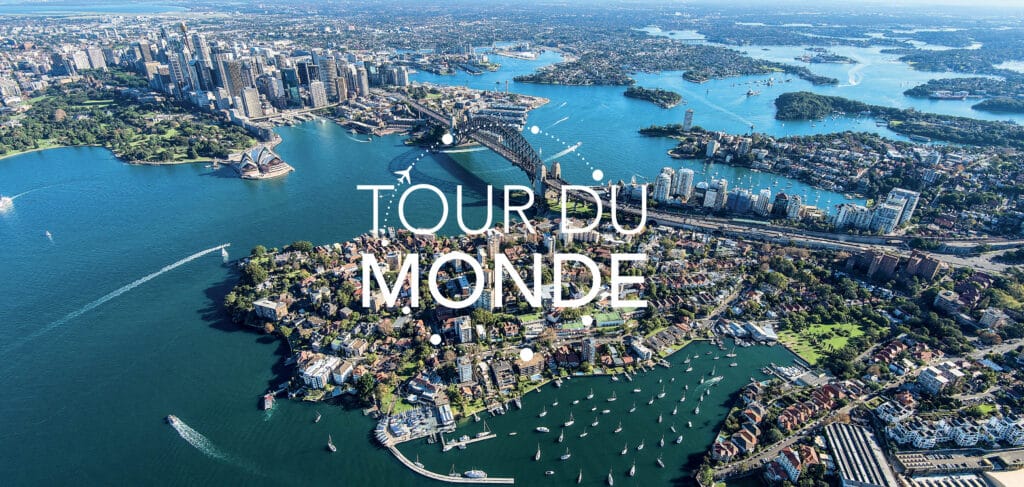 Sydney, vue aérienne sur l'Opéra et le Harbour Bridge, pour des escapades exclusives avec TMR Voyages.